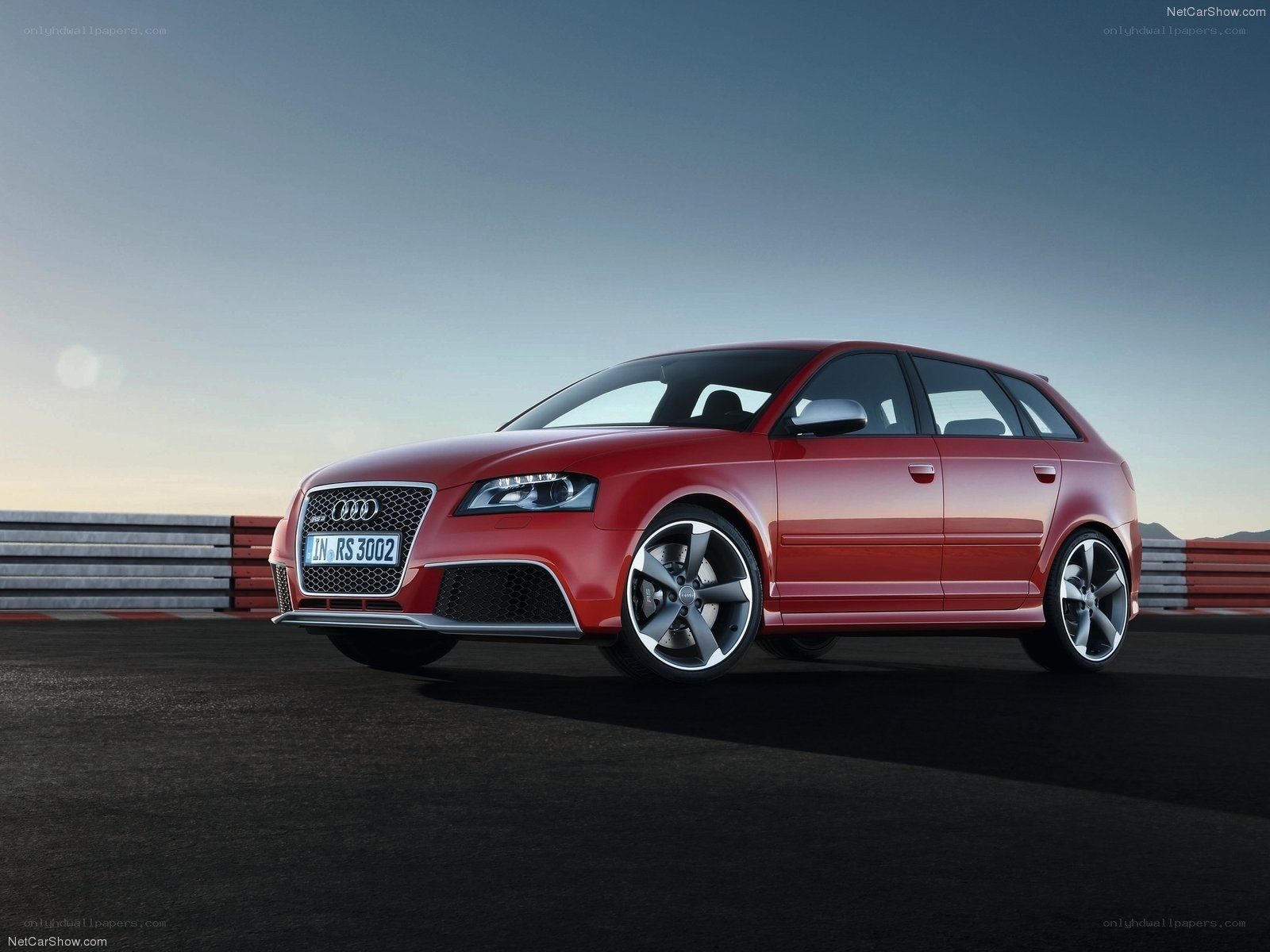 Red Audi RS3 on a racetrack