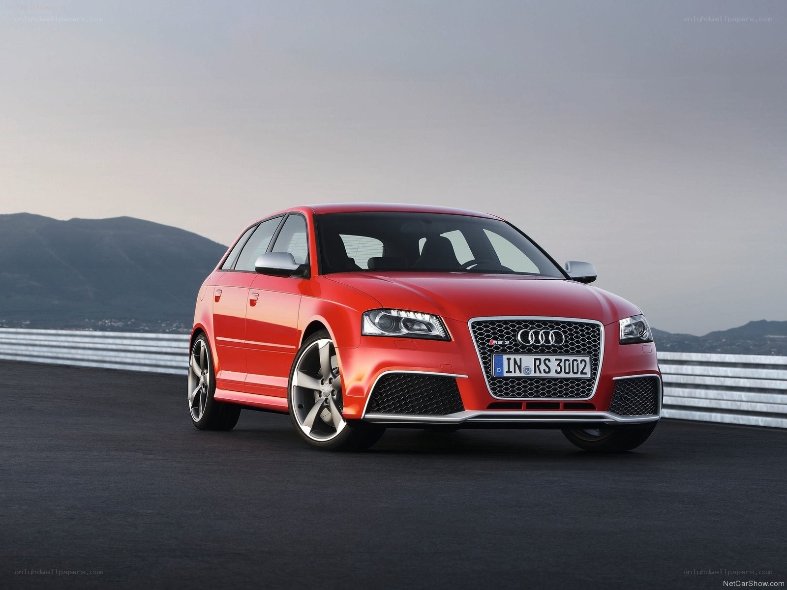 Red Audi RS3 on a racetrack
