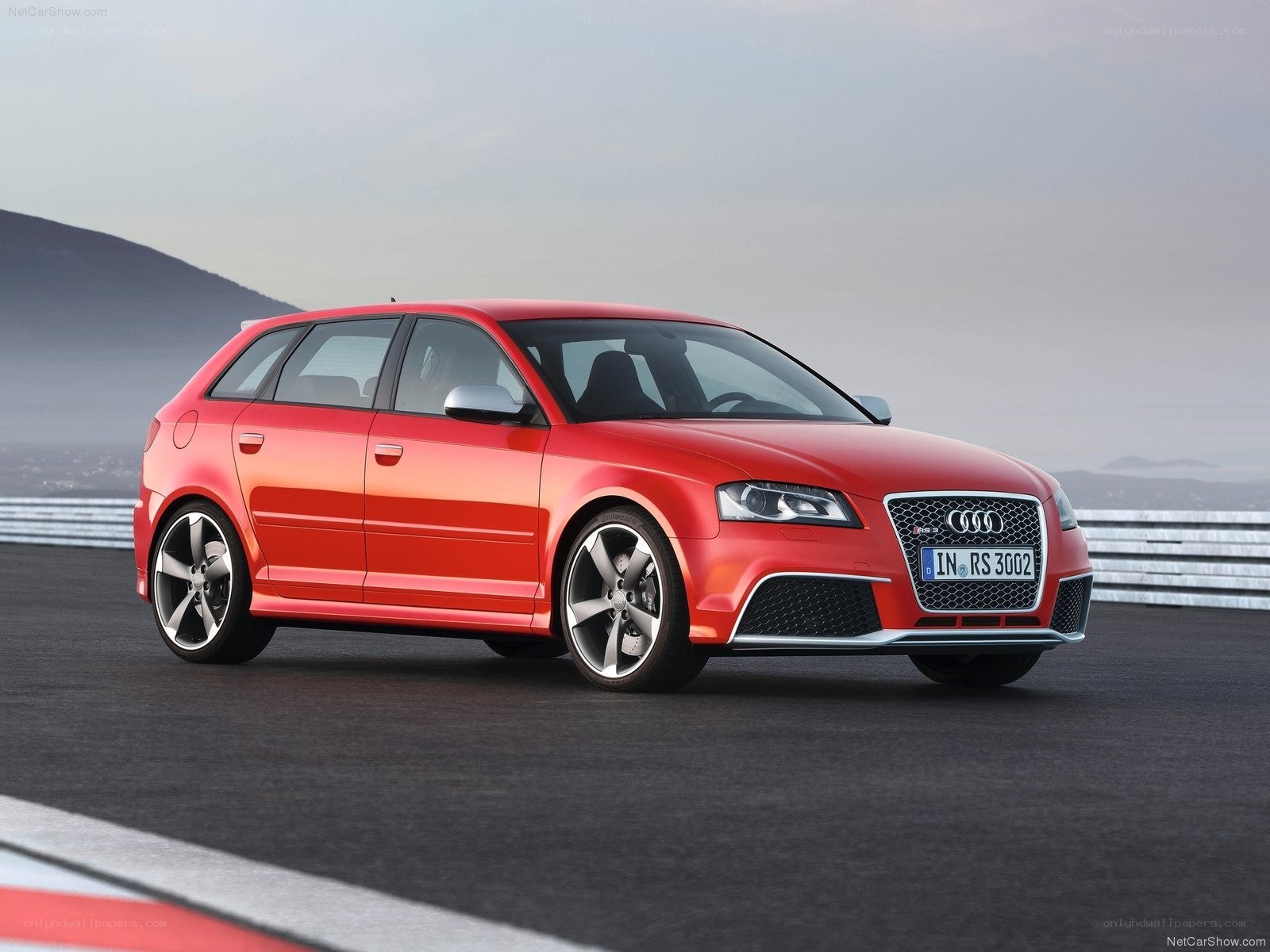 Red Audi RS3 on a racetrack