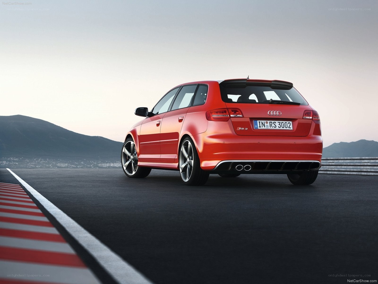 Red Audi RS3 on a racetrack