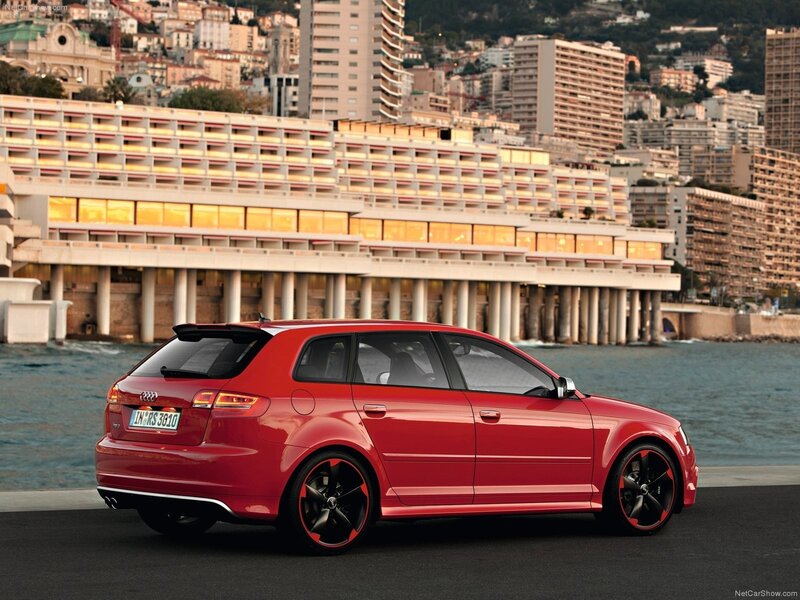Red Audi RS3 Sportback by the coast
