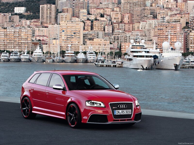Red Audi RS3 Sportback by the harbor