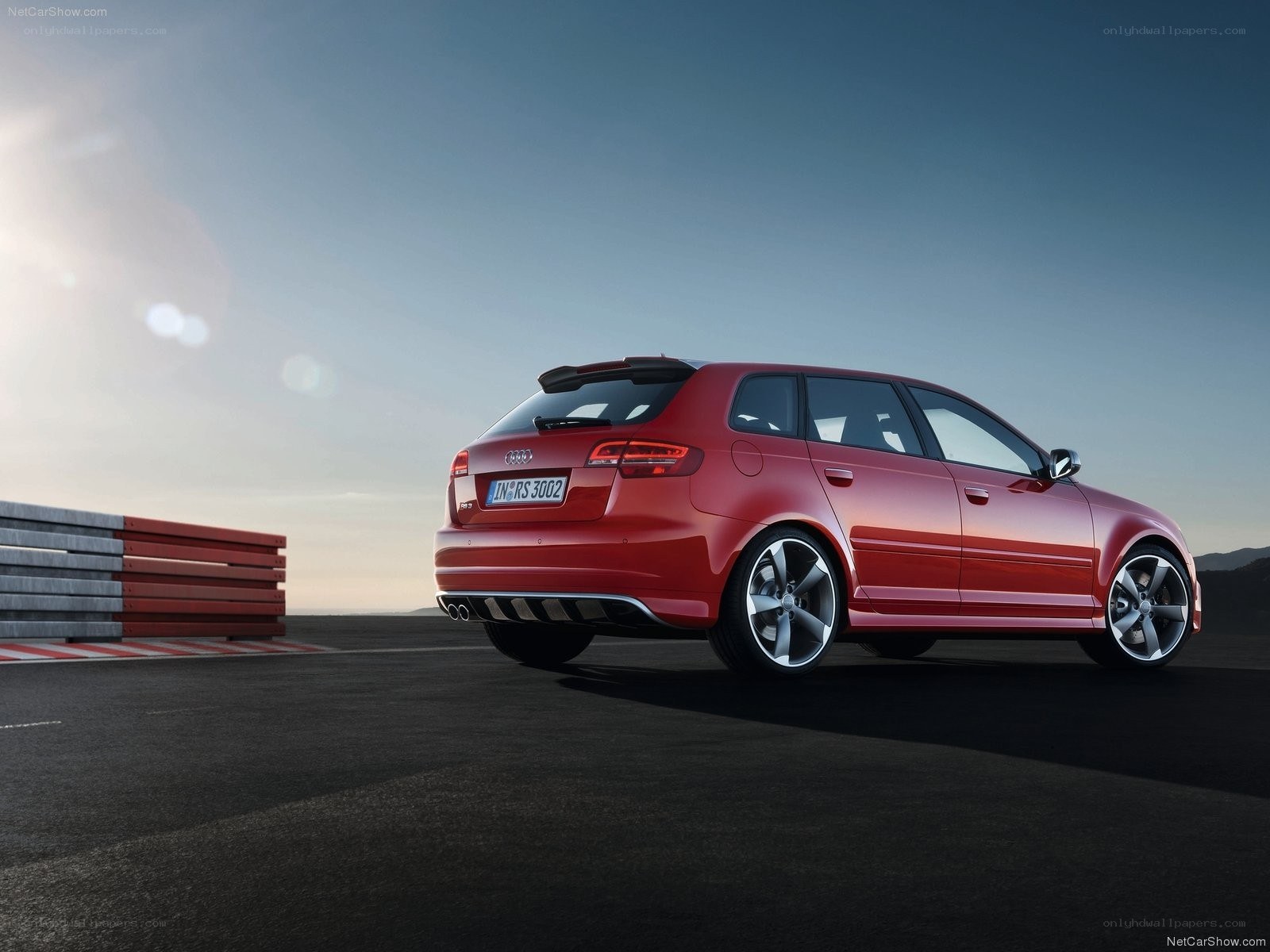 Red Audi RS3 Sportback on track