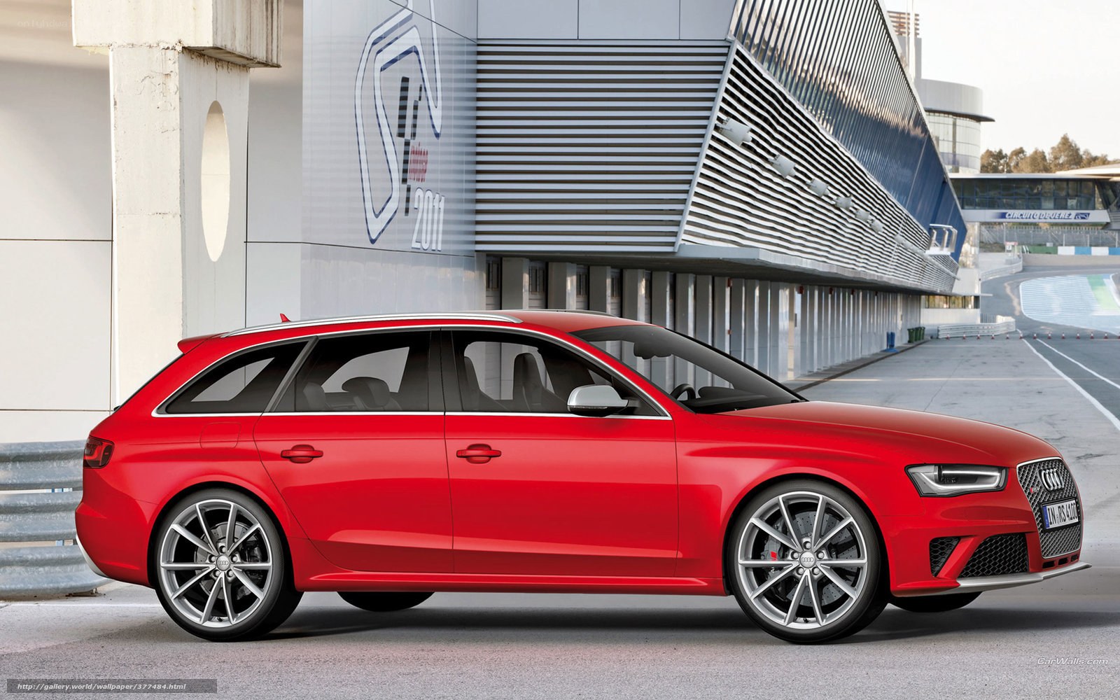 Red Audi RS4 Avant on racetrack