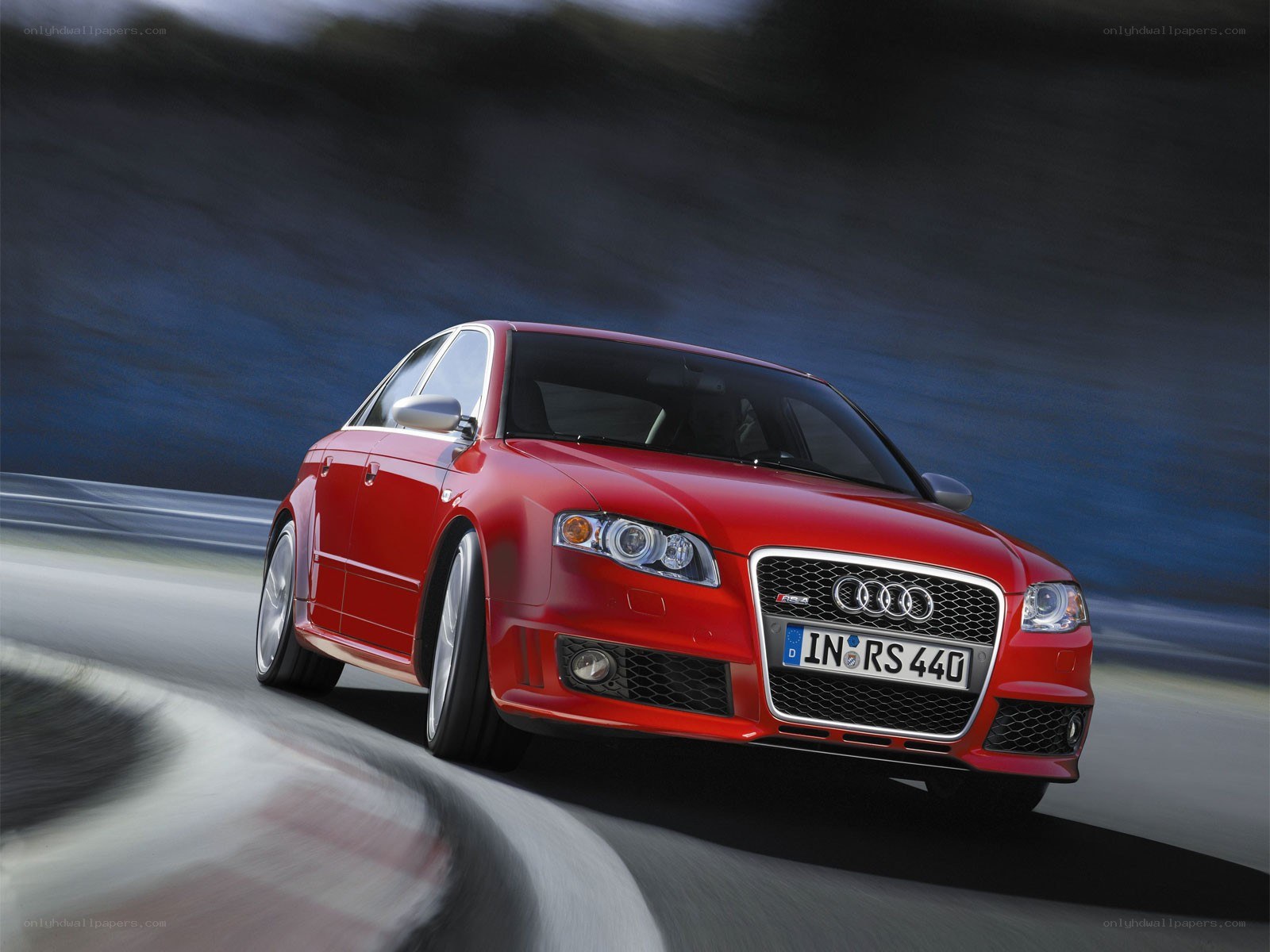 Red Audi RS4 in motion