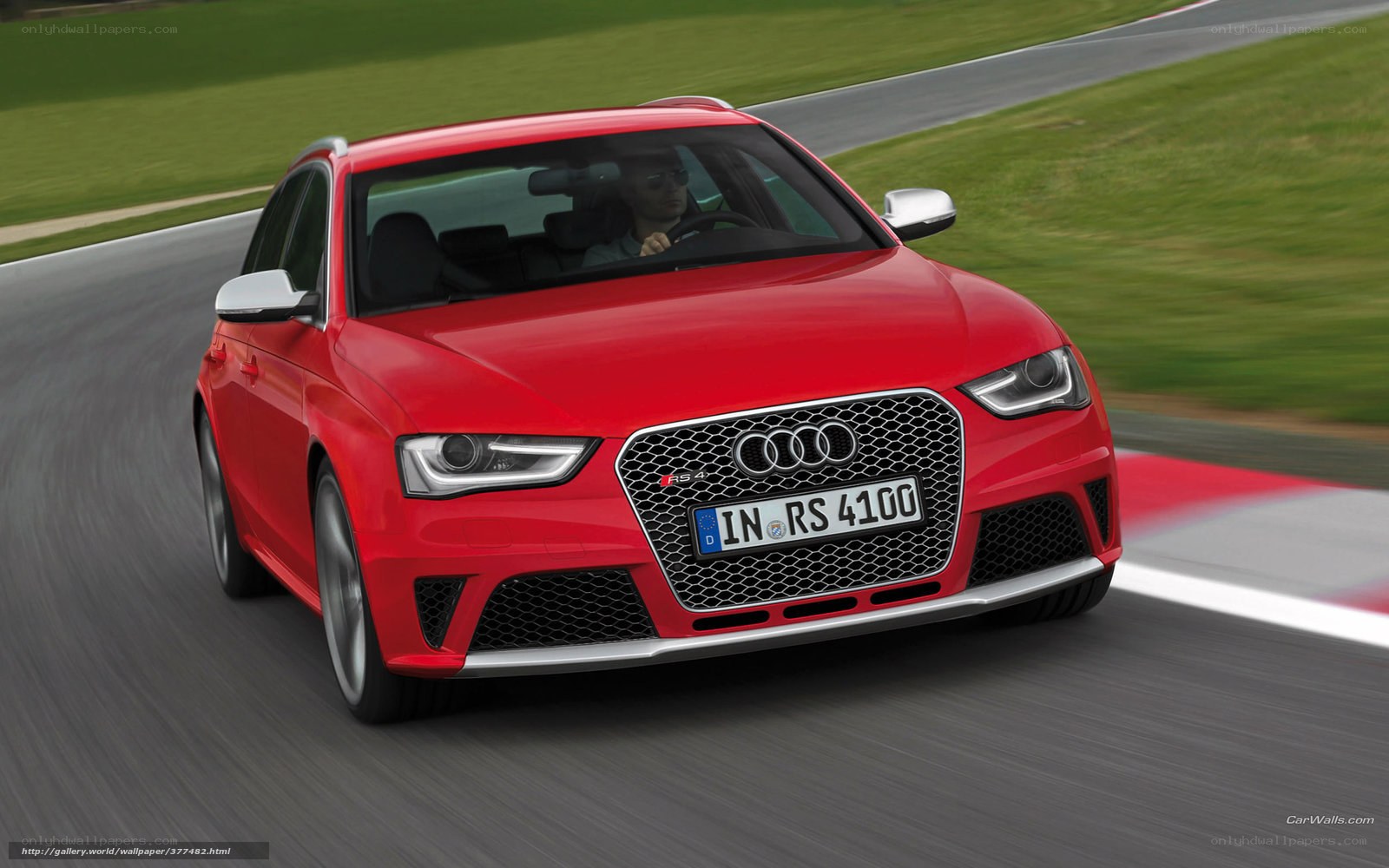 Red Audi RS4 on a racetrack
