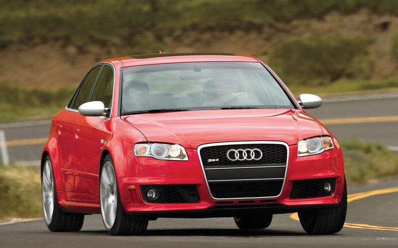 Red Audi RS4 on a road