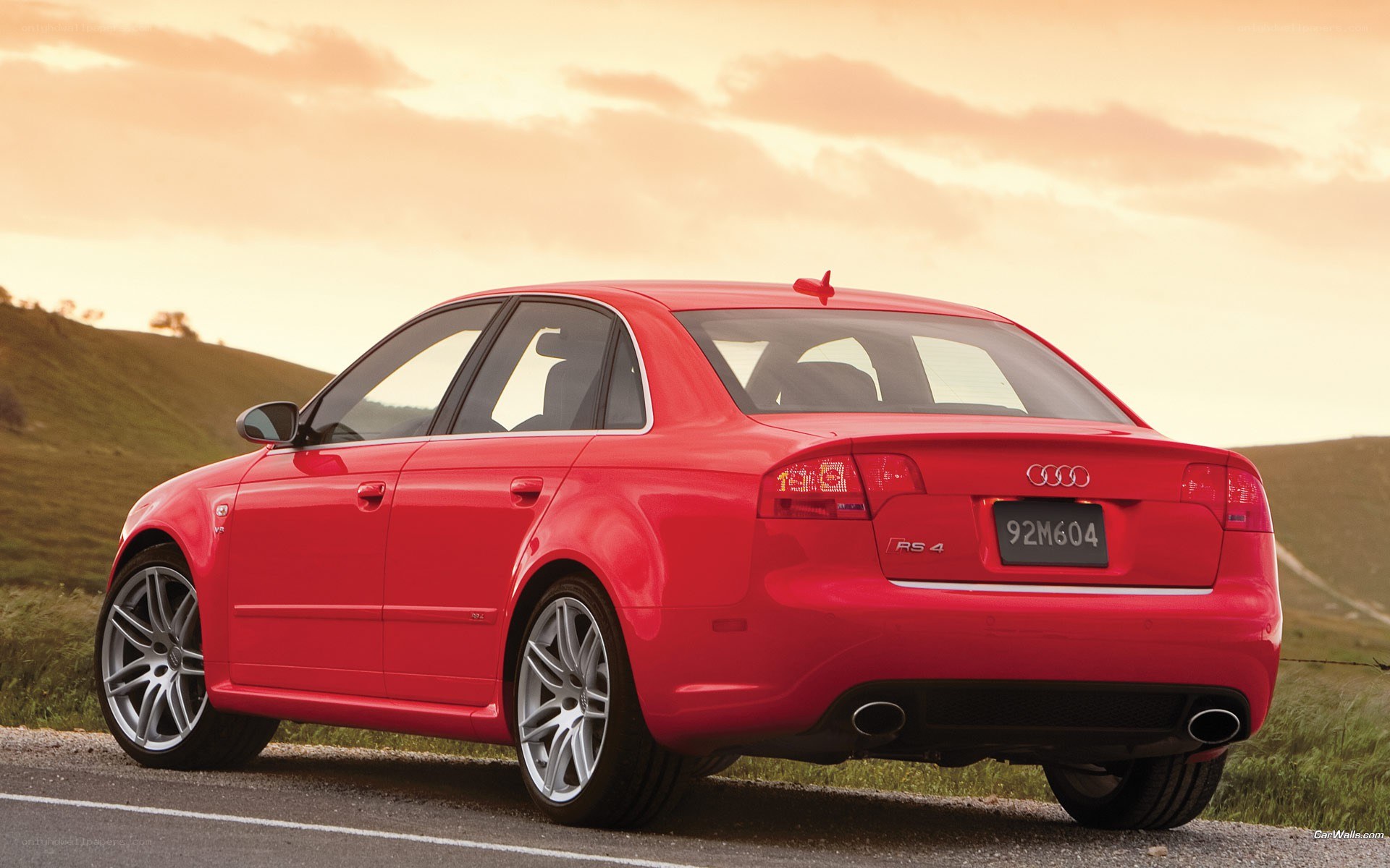 Red Audi RS4 on a road