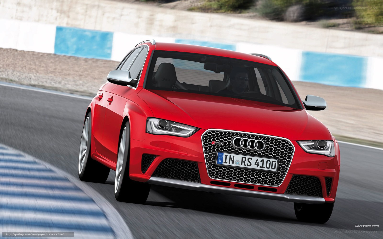 Red Audi RS4 on racetrack