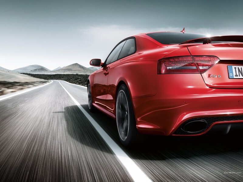 Red Audi RS5 on a desert road