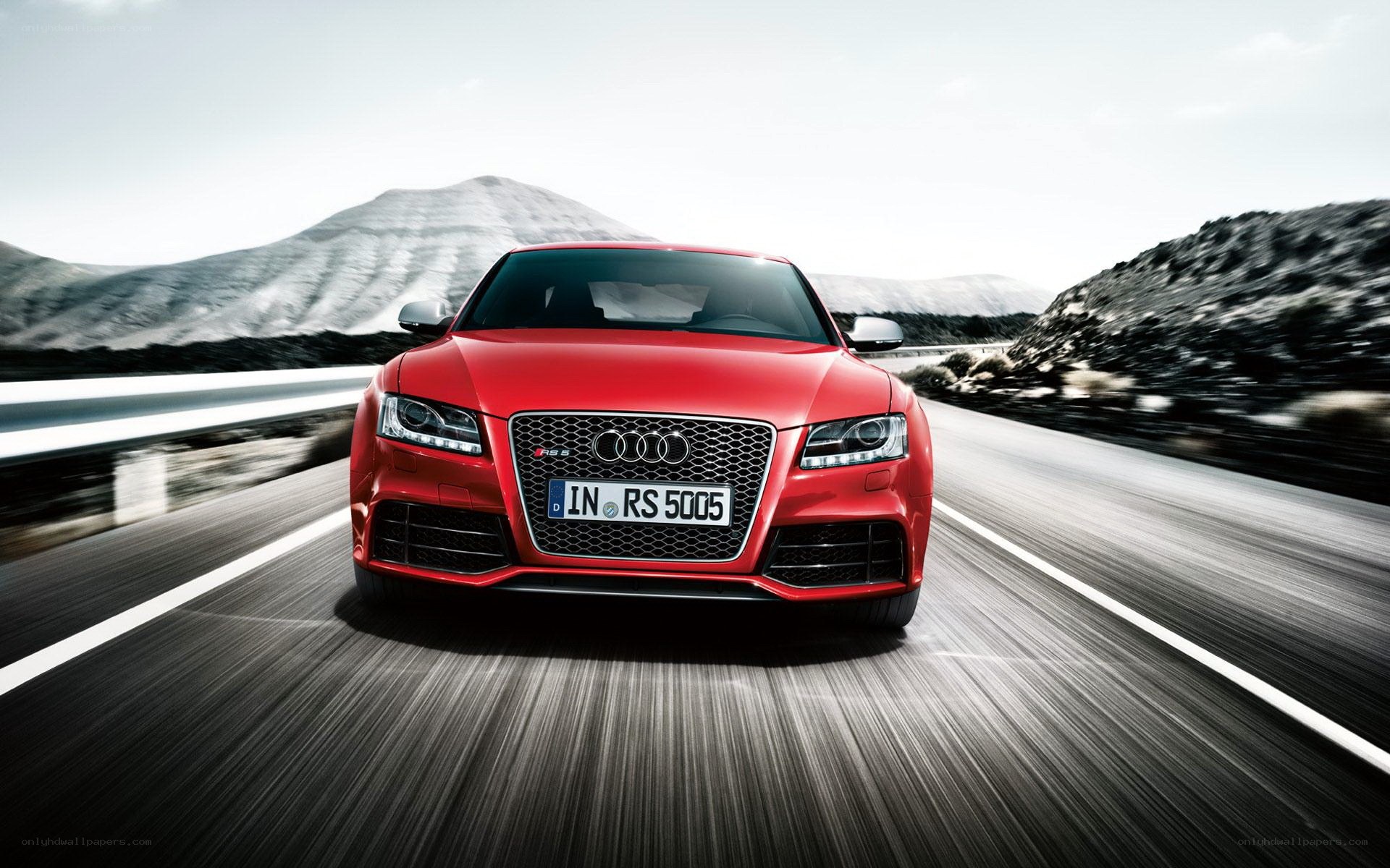 Red Audi RS5 on a mountain road