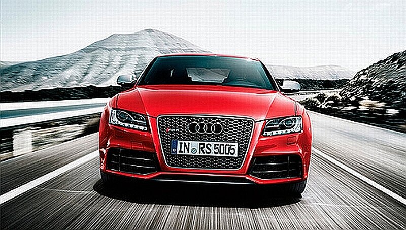 Red Audi RS5 on a mountain road