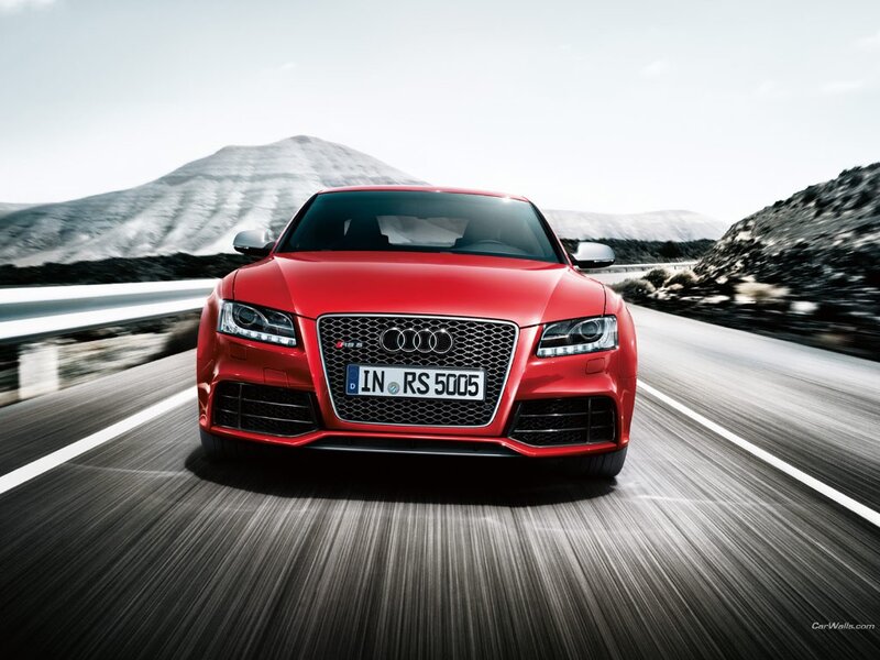 Red Audi RS5 on a mountain road