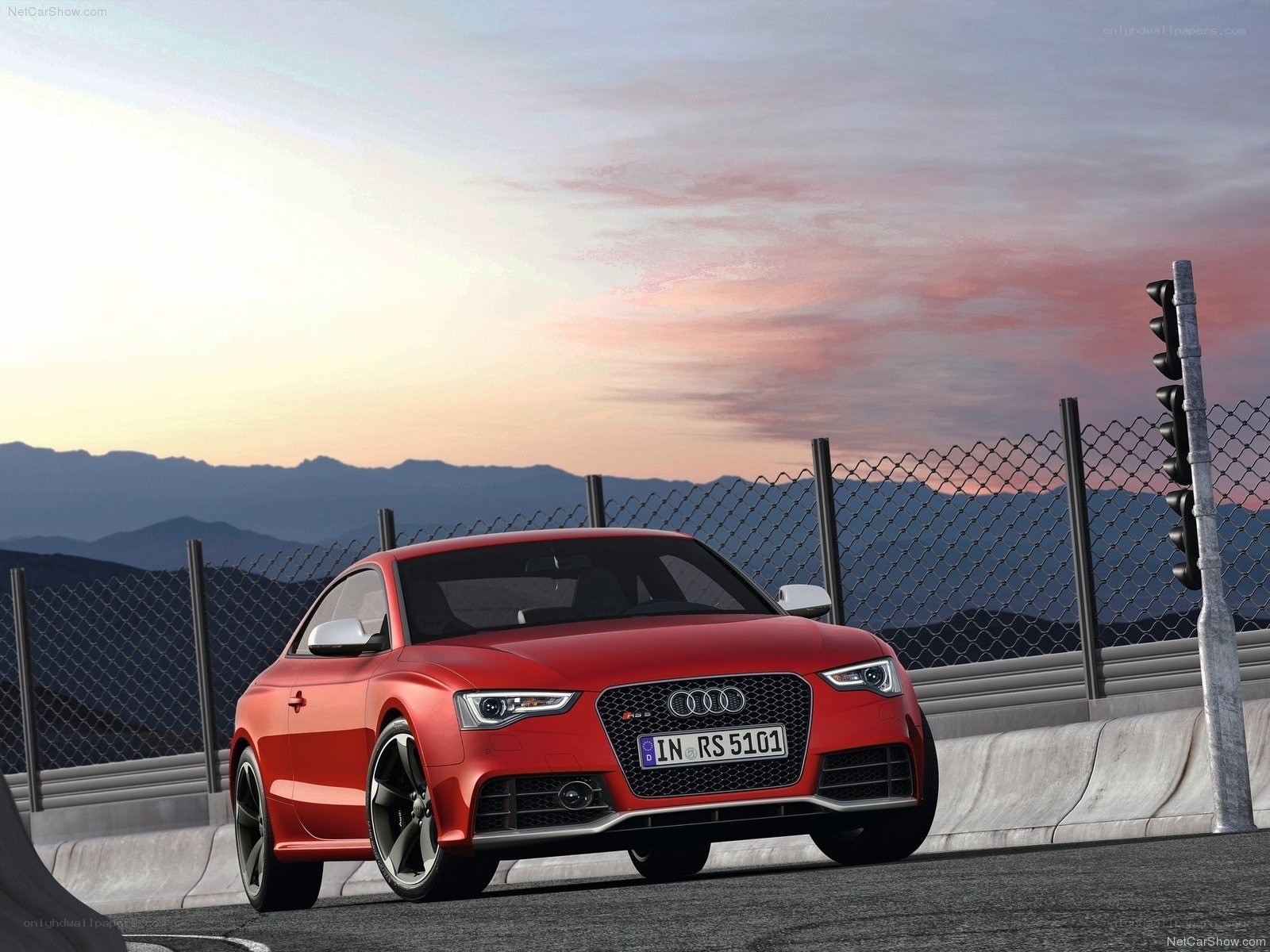 Red Audi RS5 on a racetrack