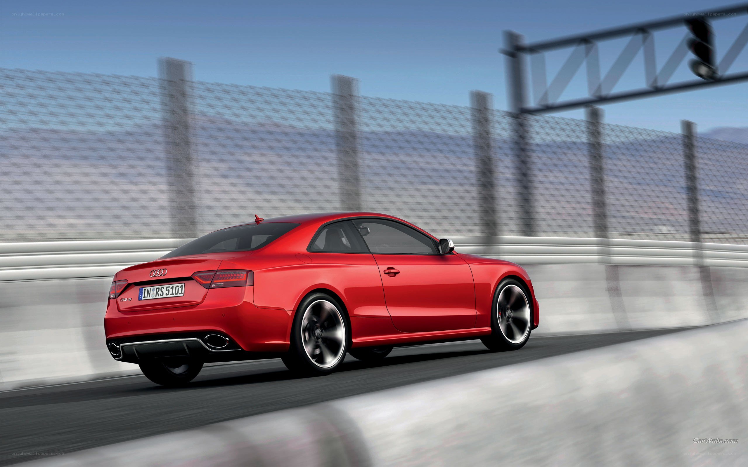 Red Audi RS5 on a racetrack
