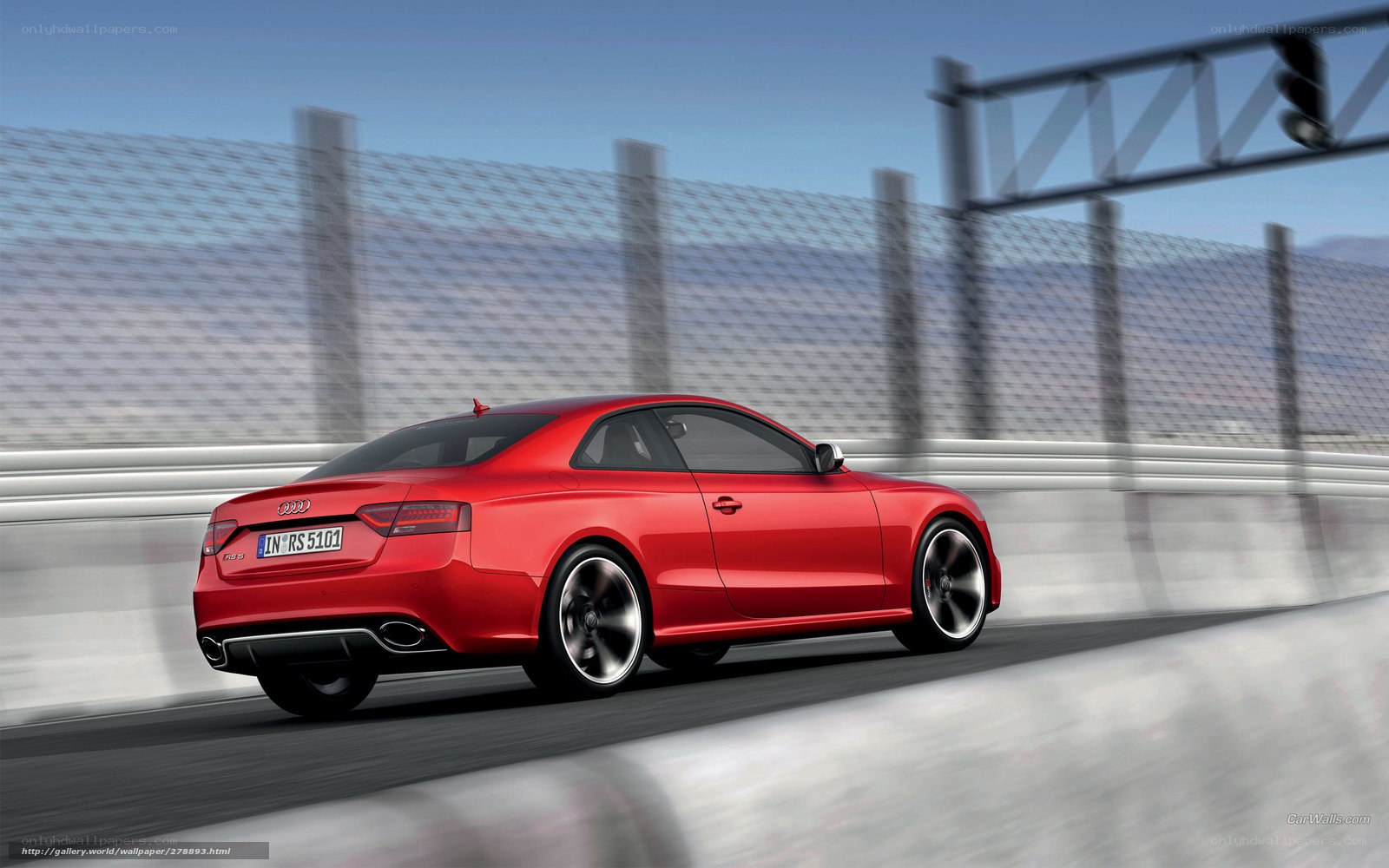 Red Audi RS5 on a racetrack