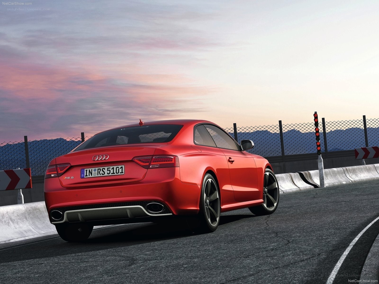 Red Audi RS5 on a racetrack