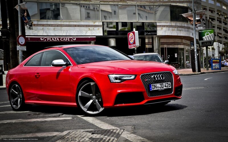 Red Audi RS5 on city street