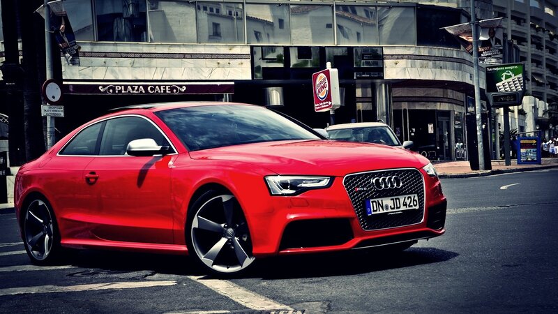 Red Audi RS5 on city street
