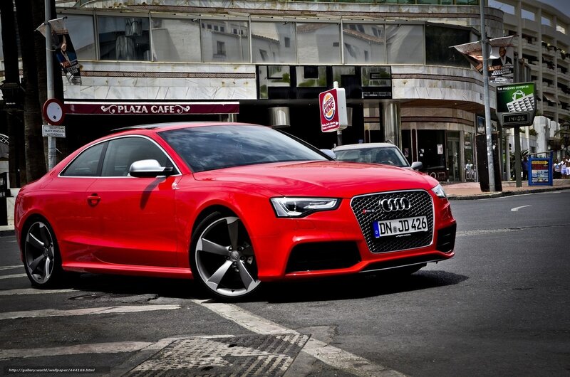 Red Audi RS5 on city street