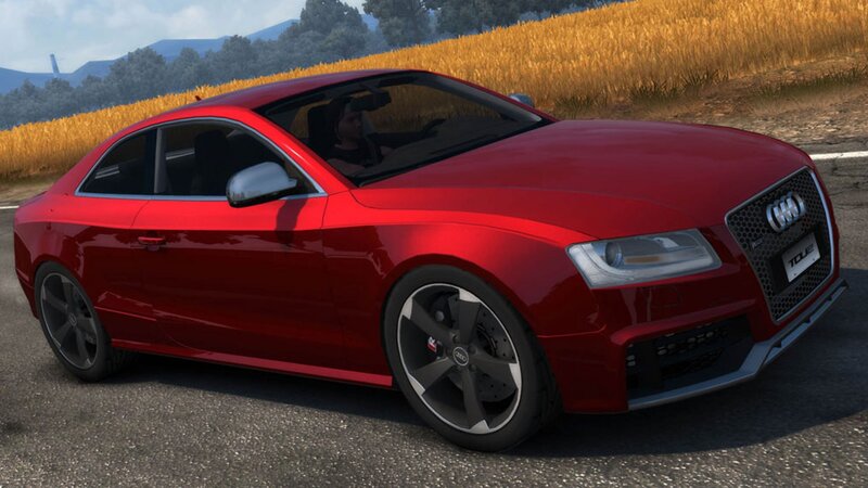 Red Audi RS5 on country road