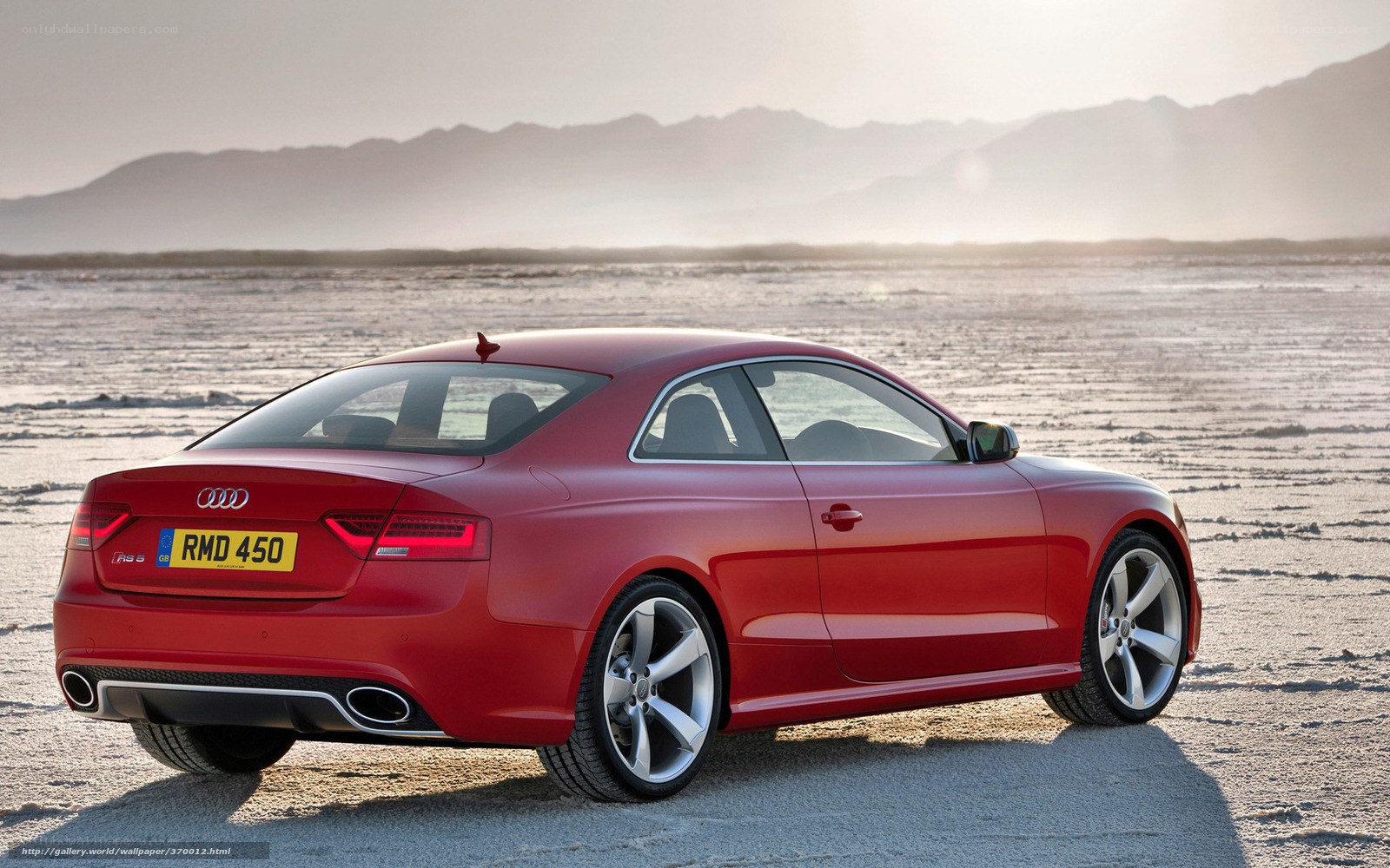 Red Audi RS5 on desert plain