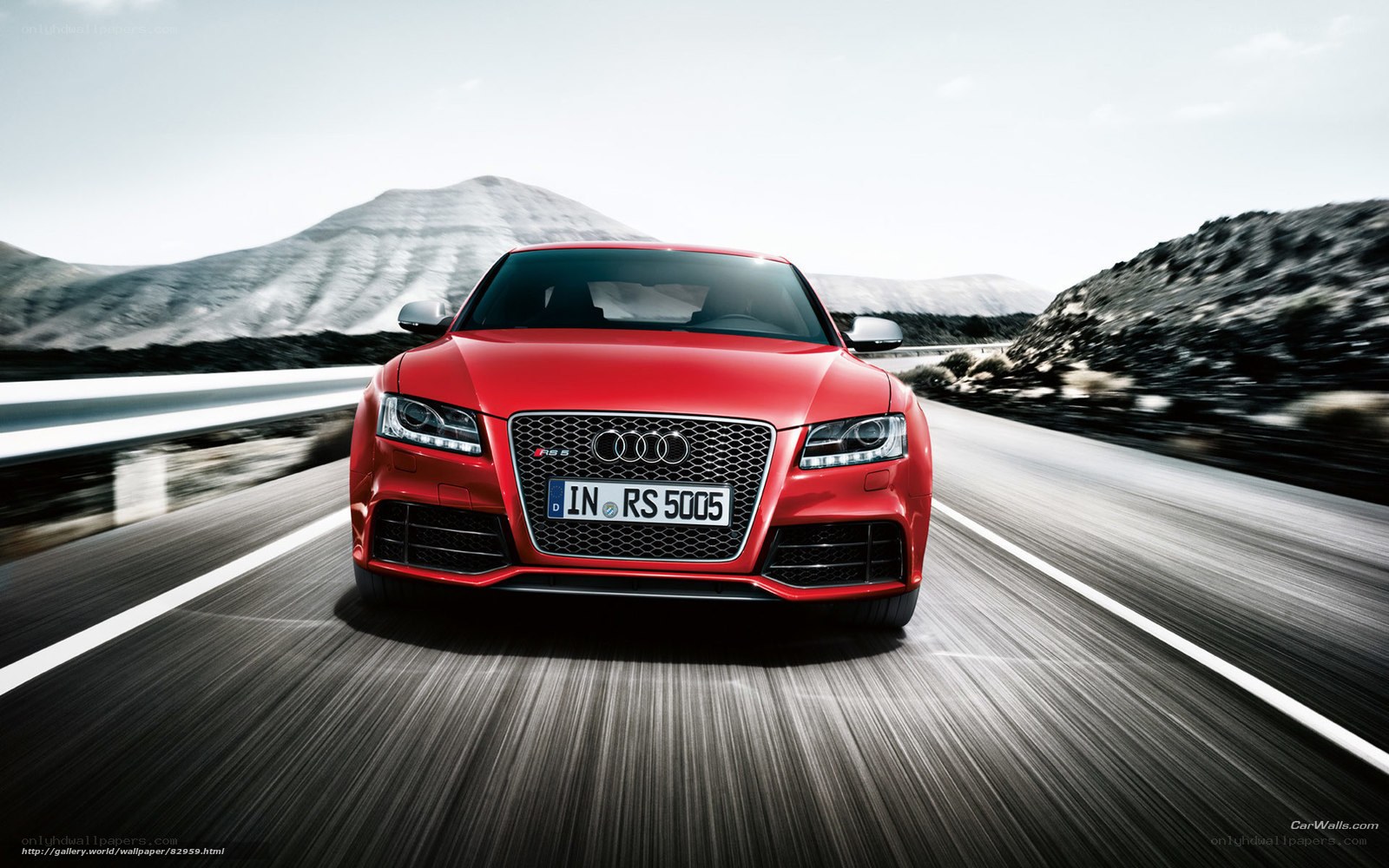 Red Audi RS5 on mountain road