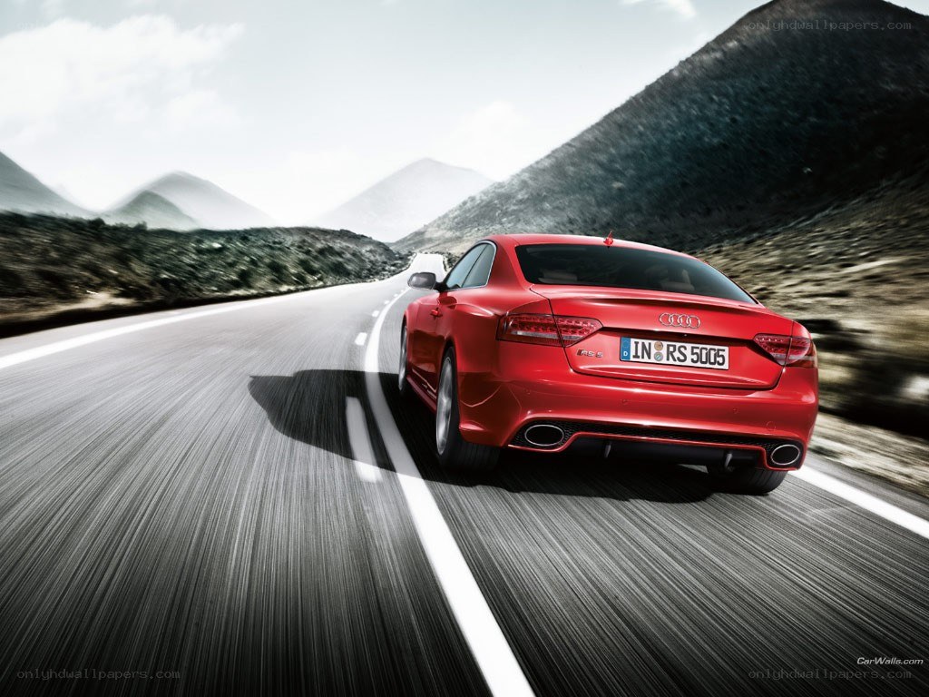 Red Audi RS5 on mountain road