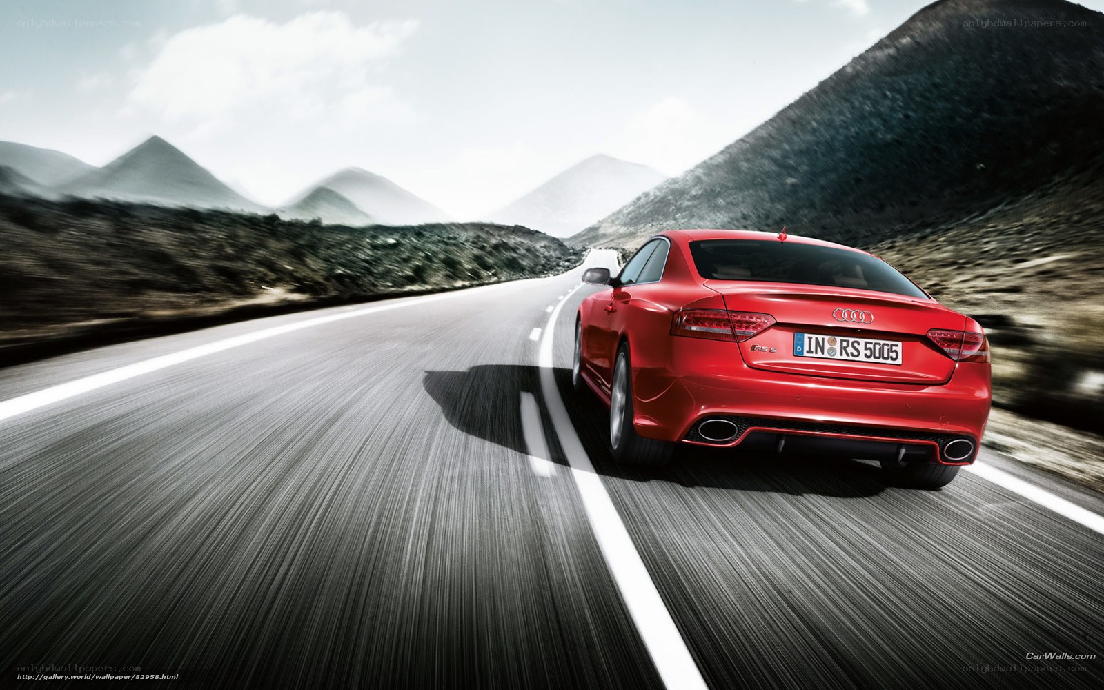 Red Audi RS5 on mountain road