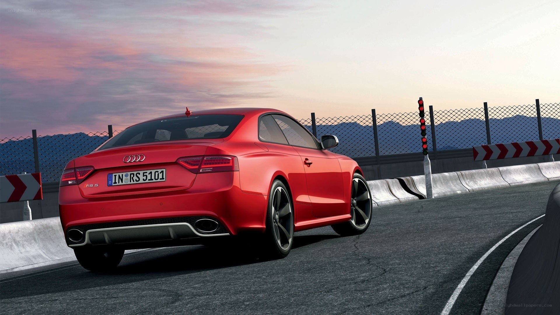Red Audi RS5 on racetrack