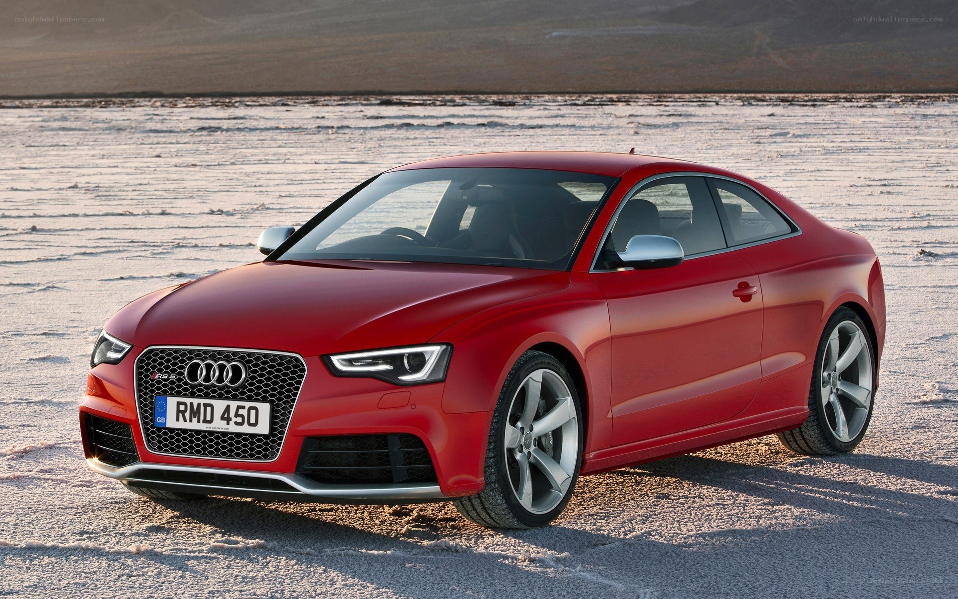 Red Audi RS5 on salt flat