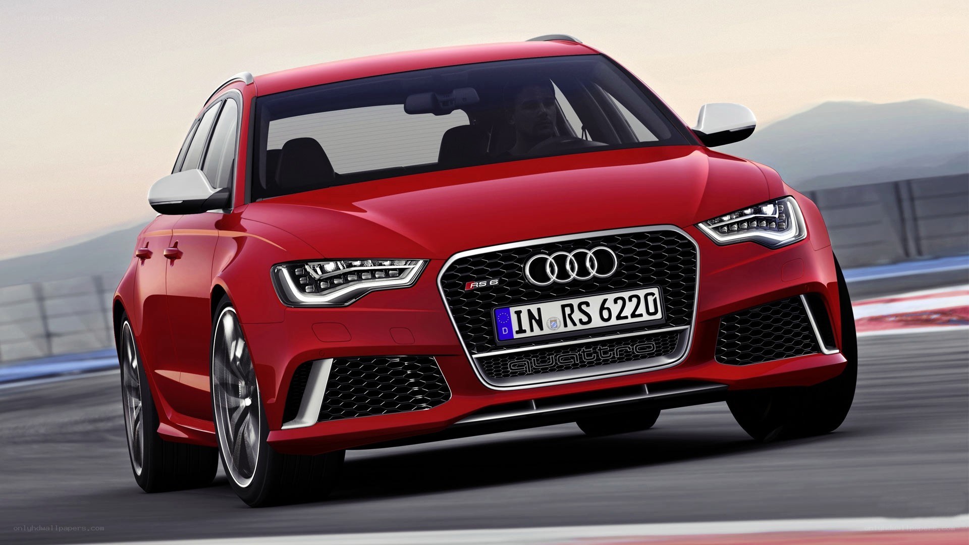 Red Audi RS6 on a racetrack