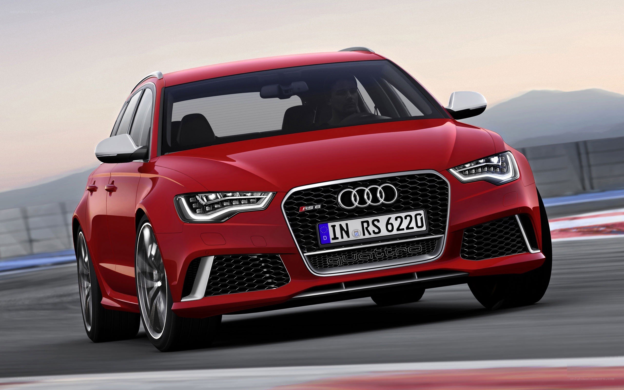 Red Audi RS6 on a racetrack