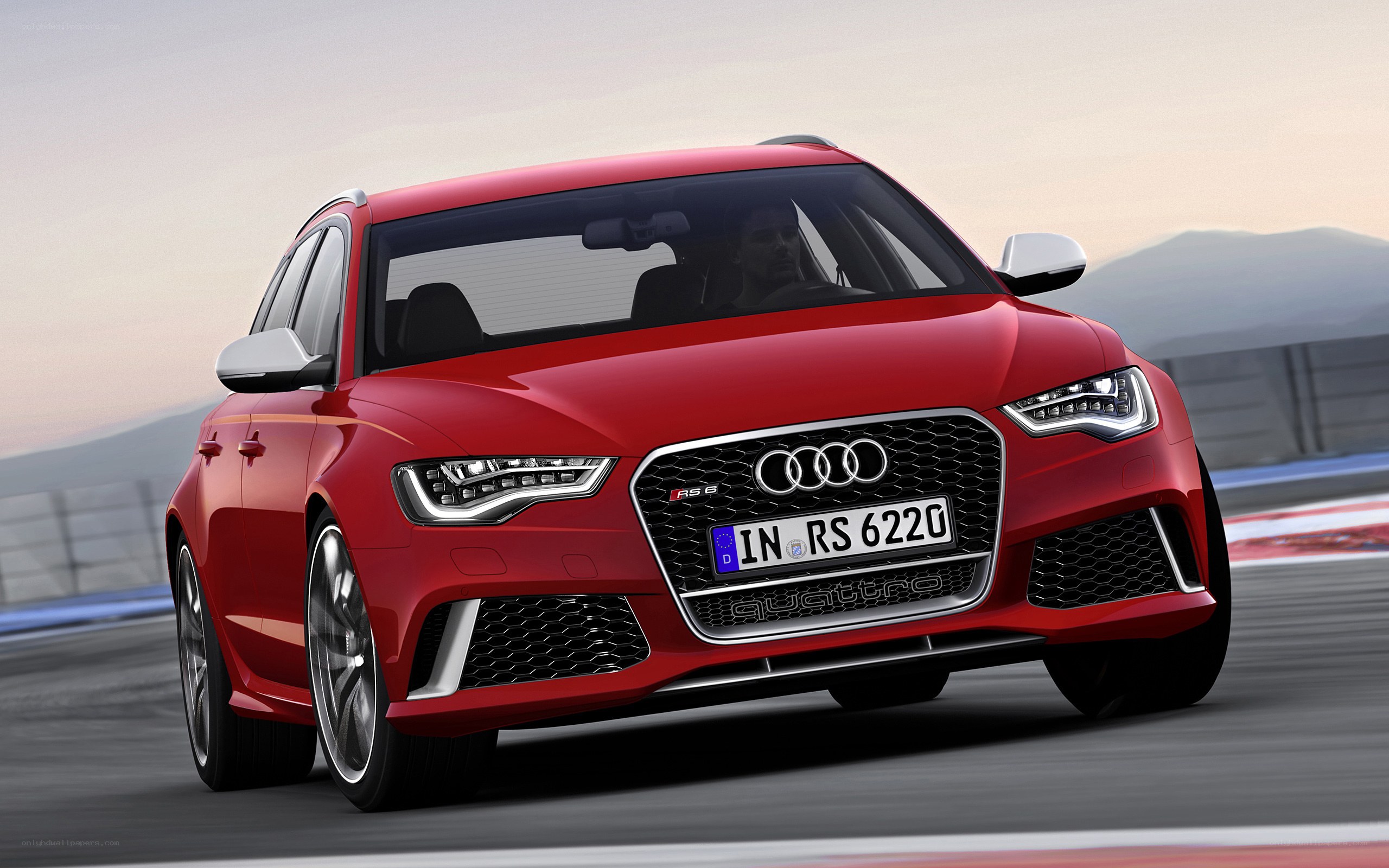 Red Audi RS6 on a racetrack