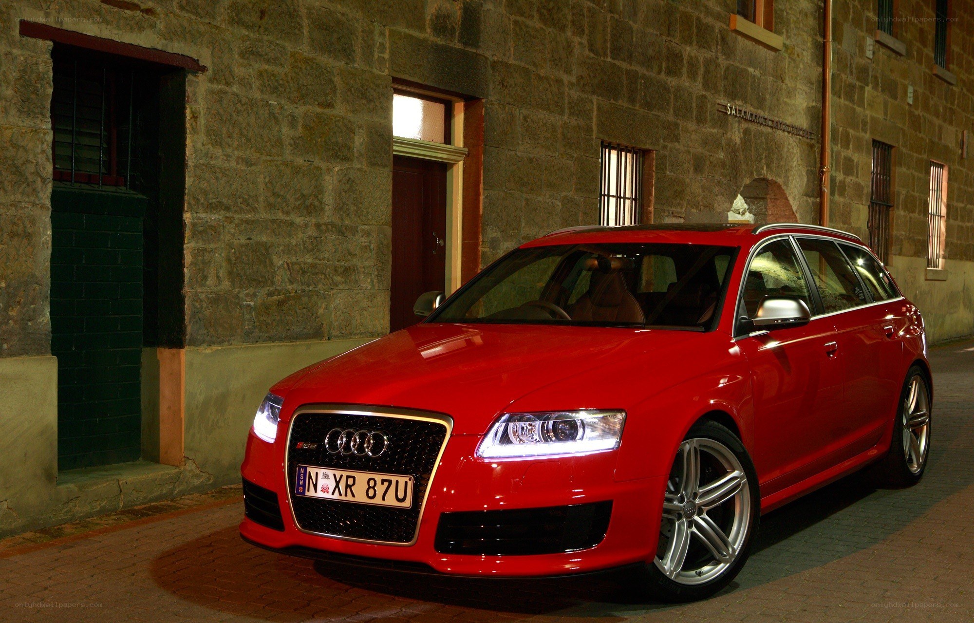 Red Audi RS6 parked at night