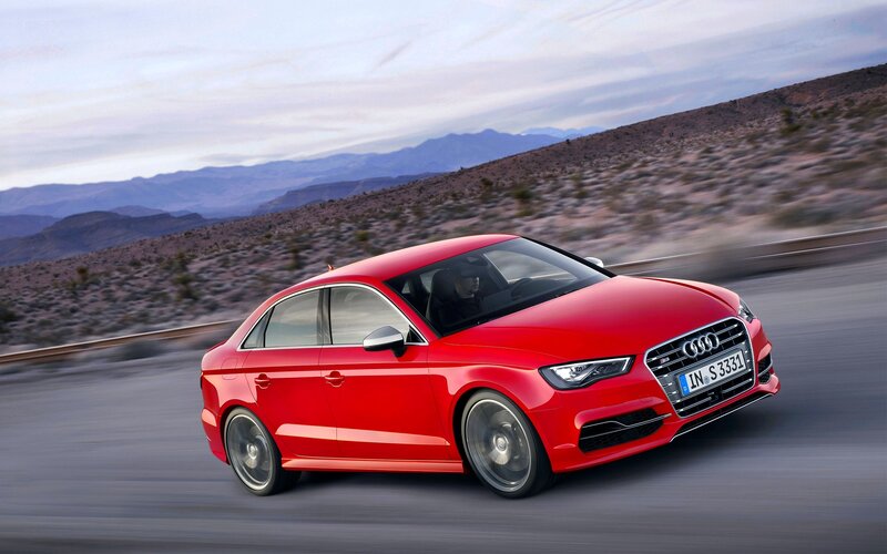 Red Audi S3 in motion