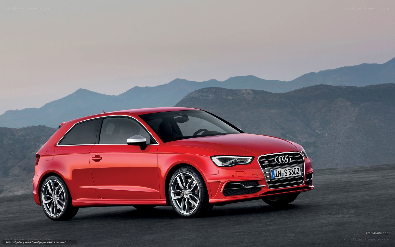 Red Audi S3 on mountain road