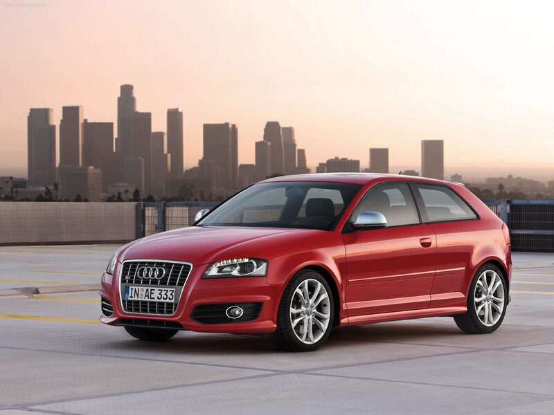 Red Audi S3 parked in city