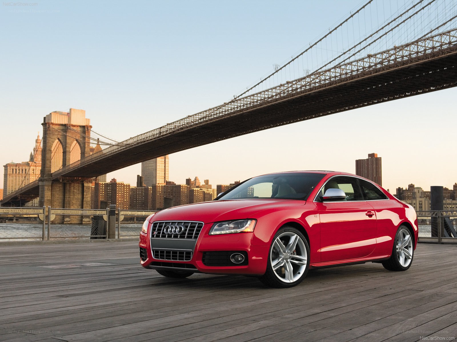 Red Audi S5 by Brooklyn Bridge