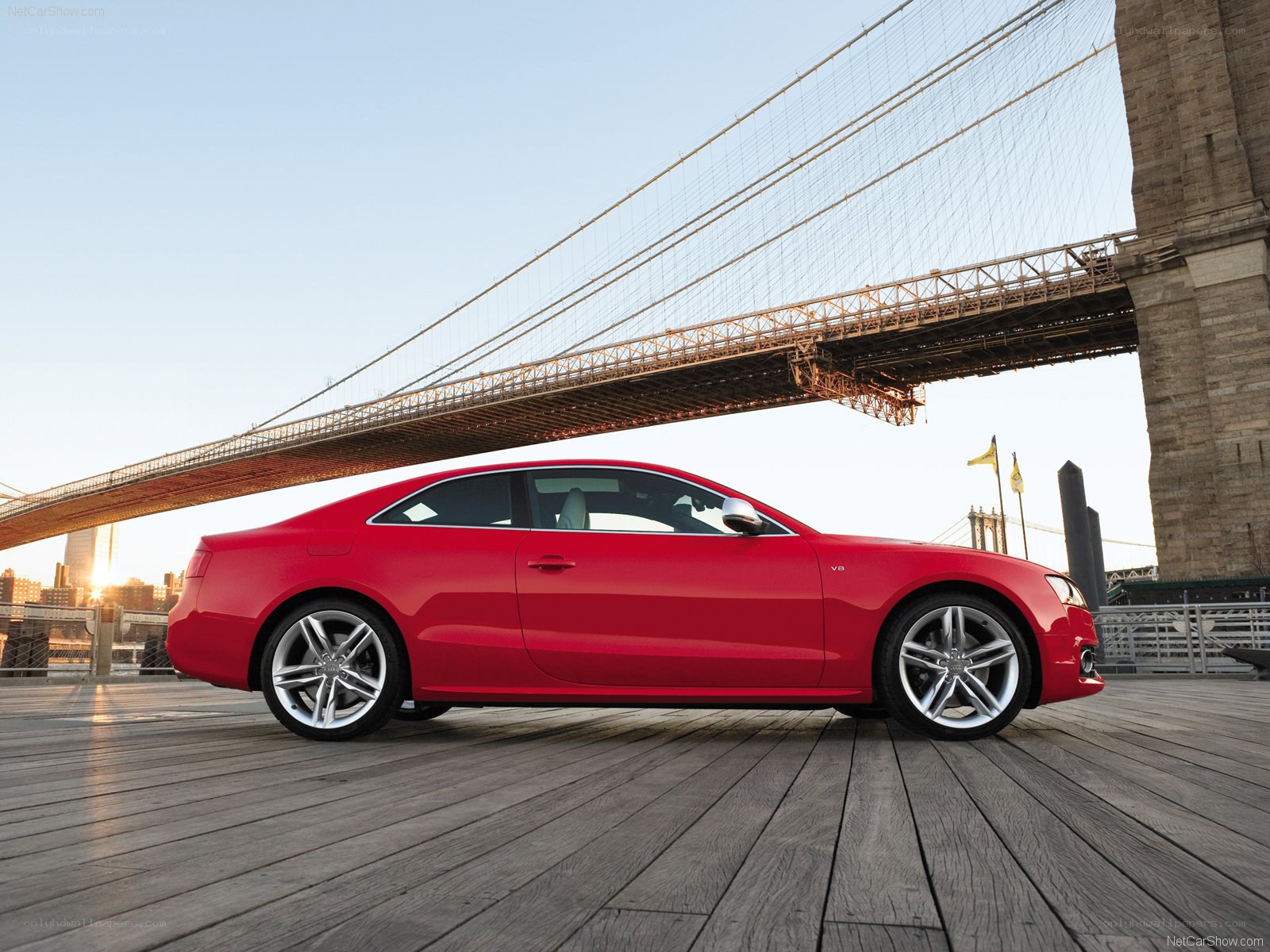 Red Audi S5 by Brooklyn Bridge