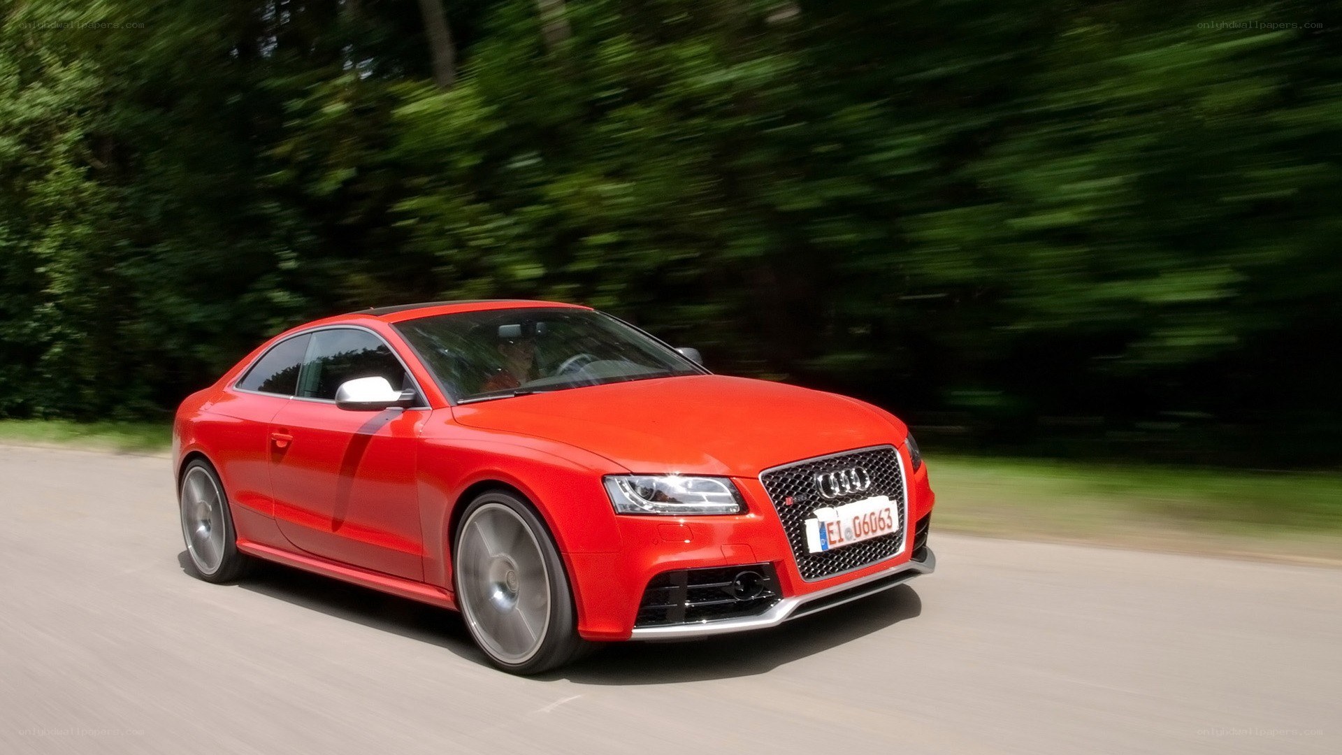 Red Audi S5 in motion