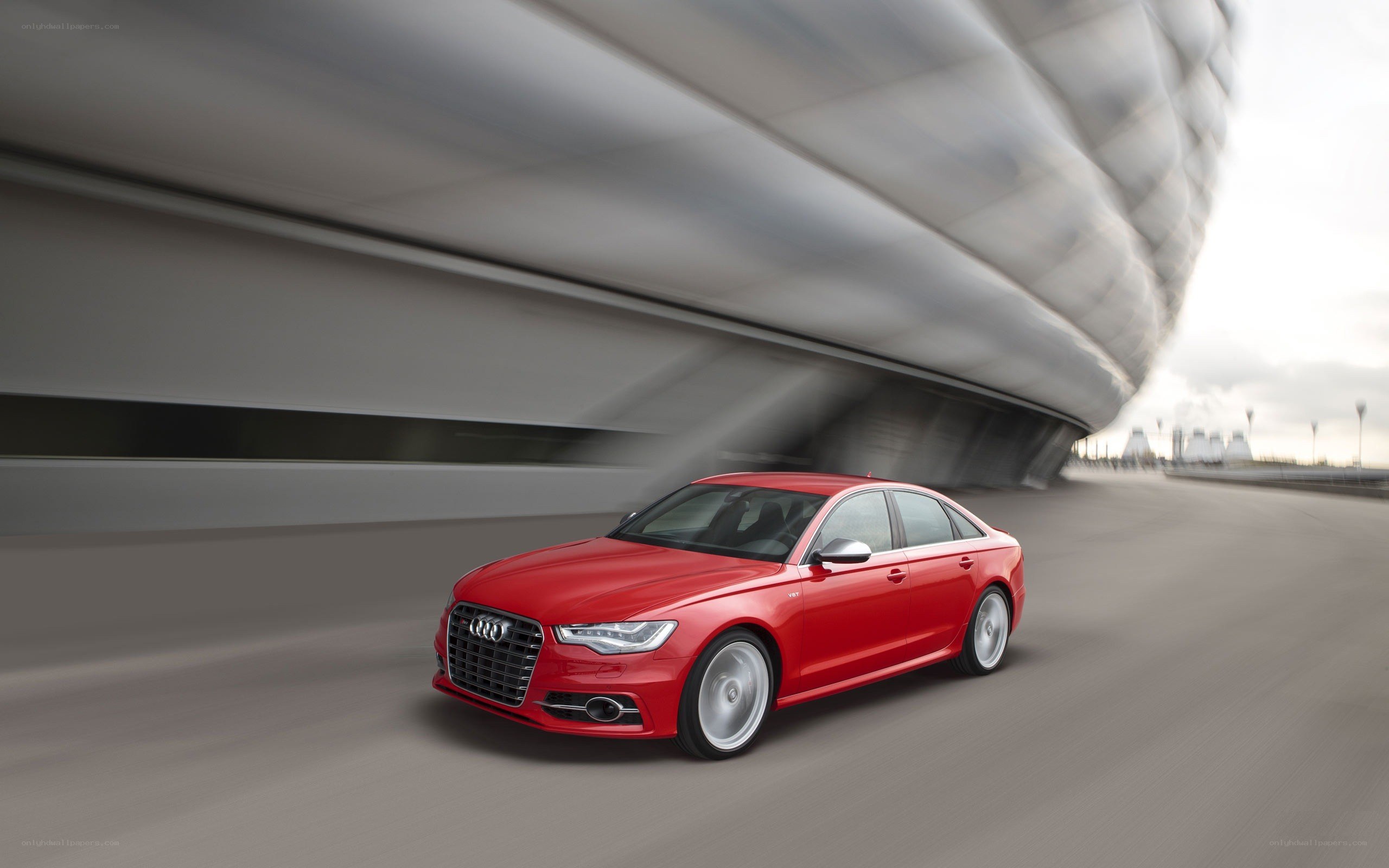 Red Audi S6 in motion