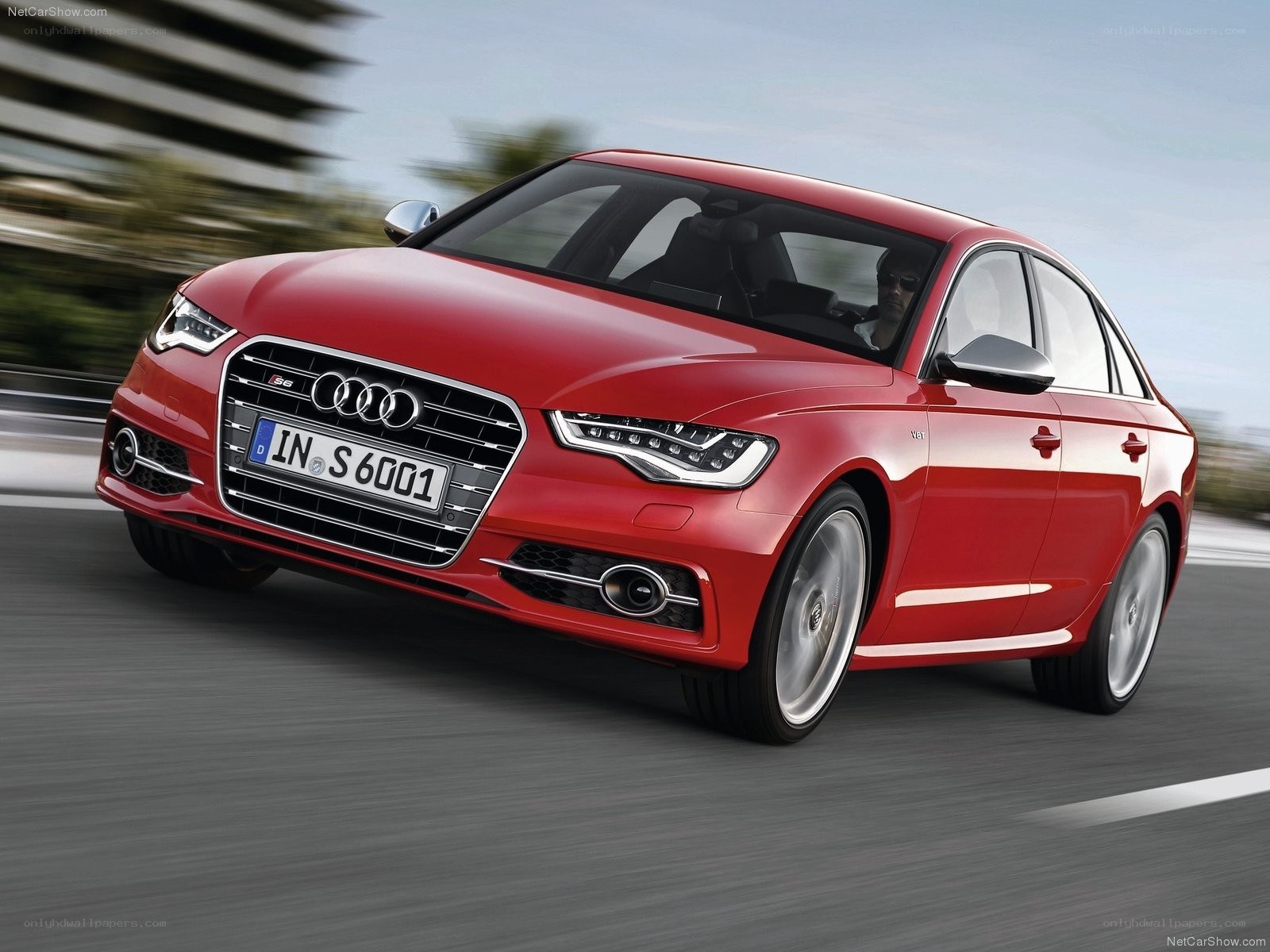Red Audi S6 in motion