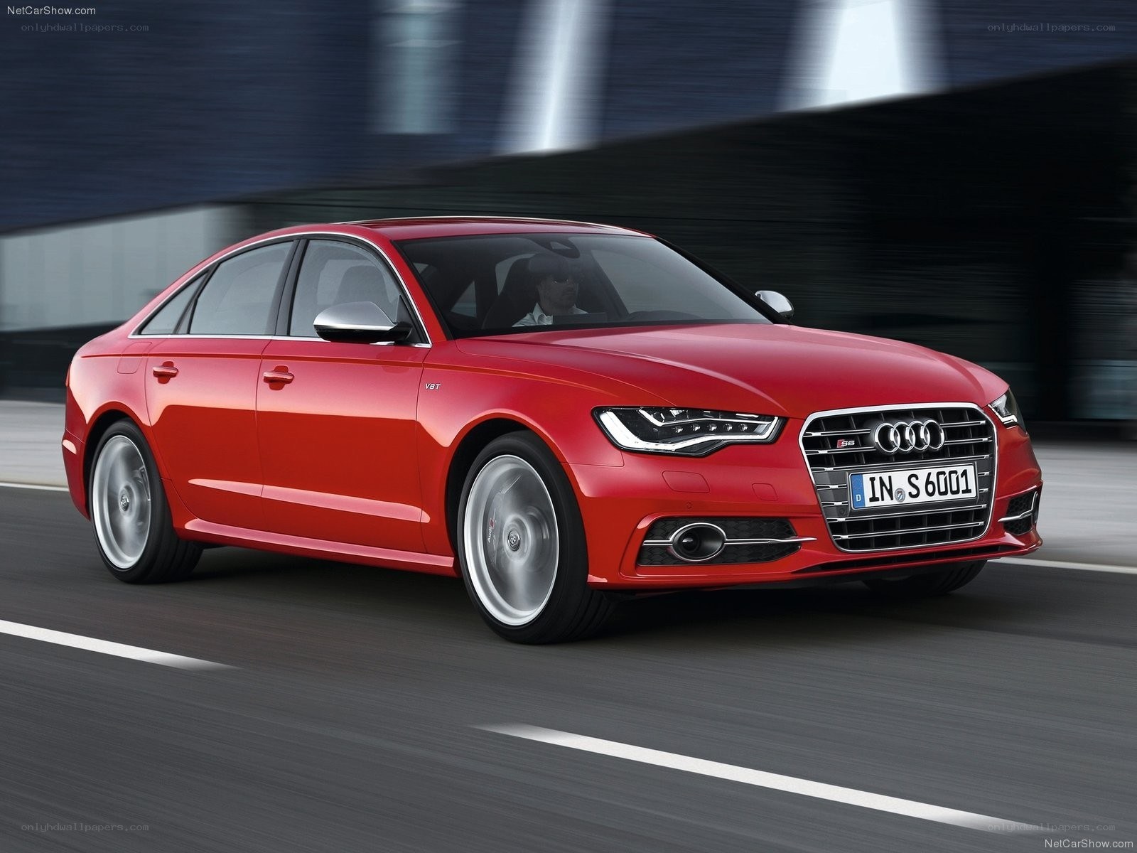 Red Audi S6 in motion
