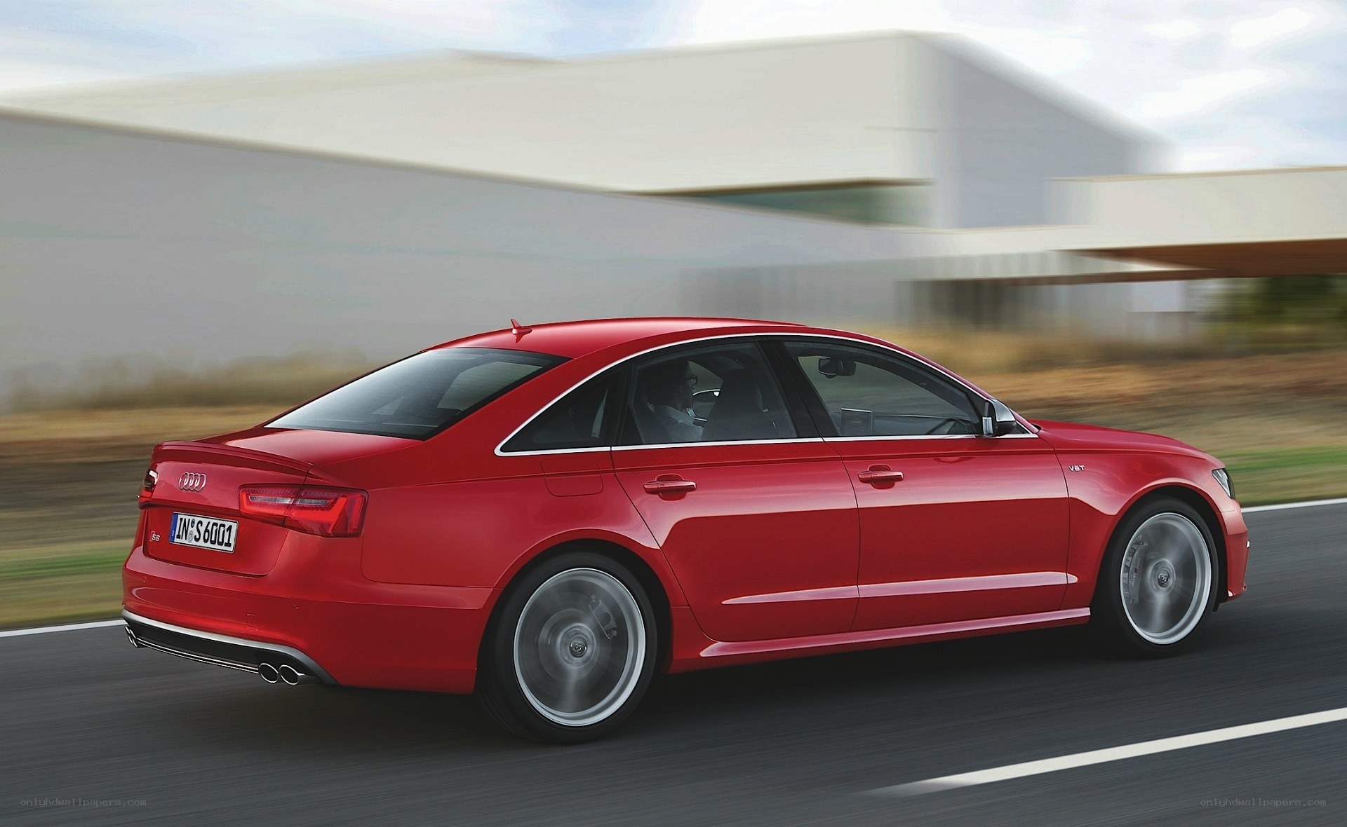 Red Audi S6 in motion