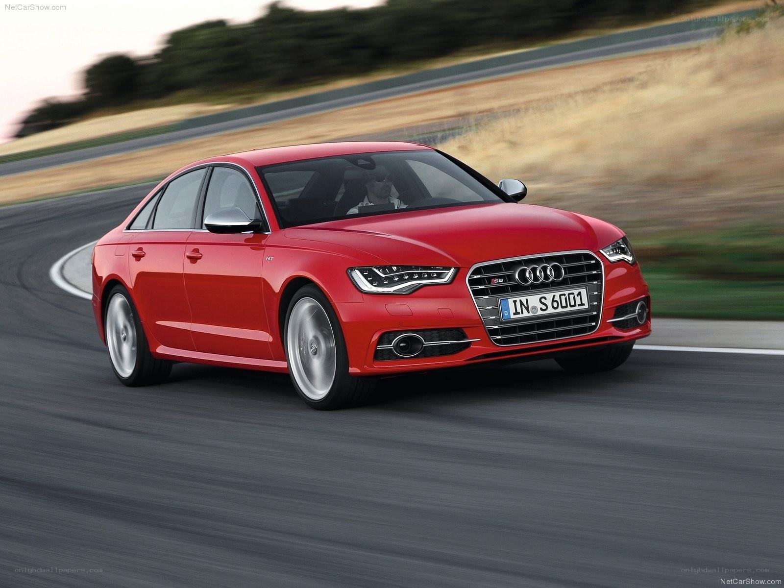 Red Audi S6 on a racetrack