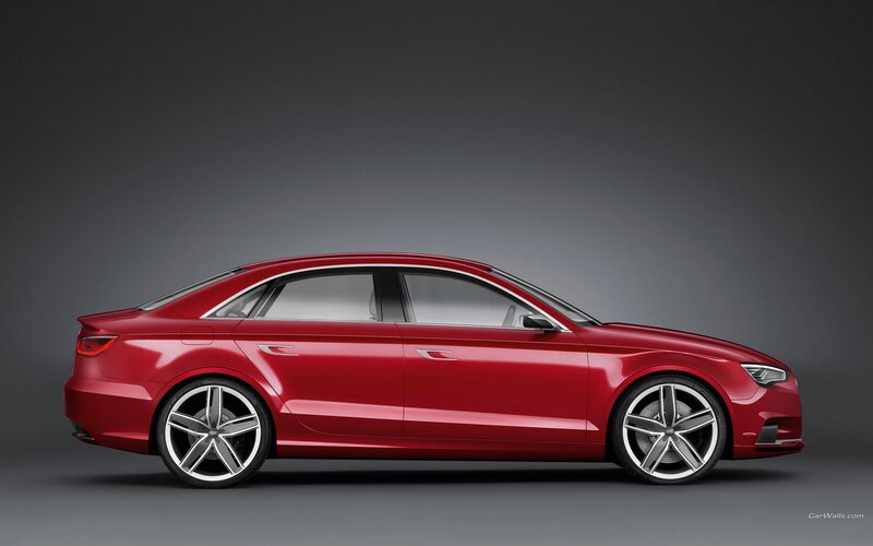 red audi sedan side profile