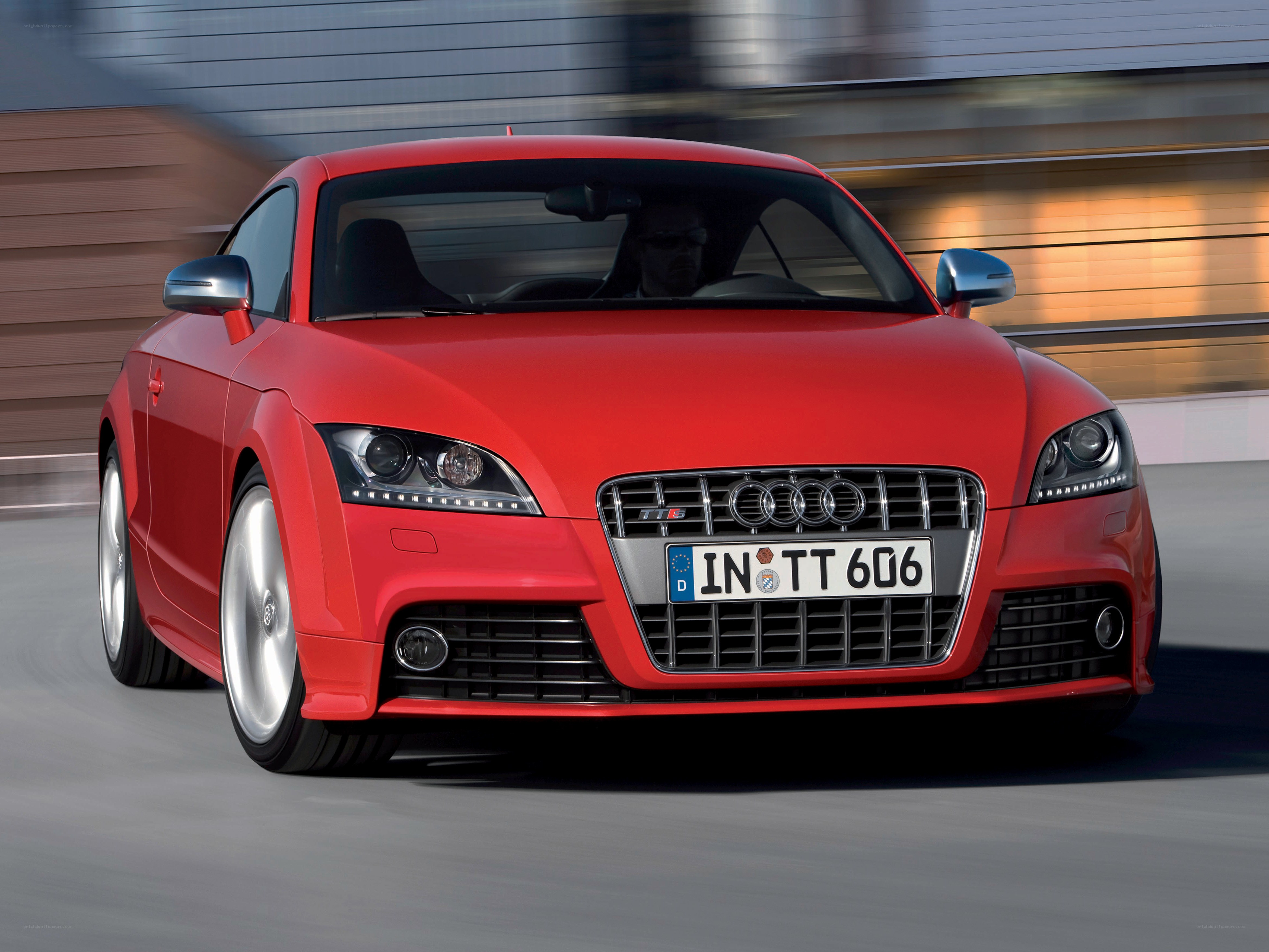 Red Audi TT in motion