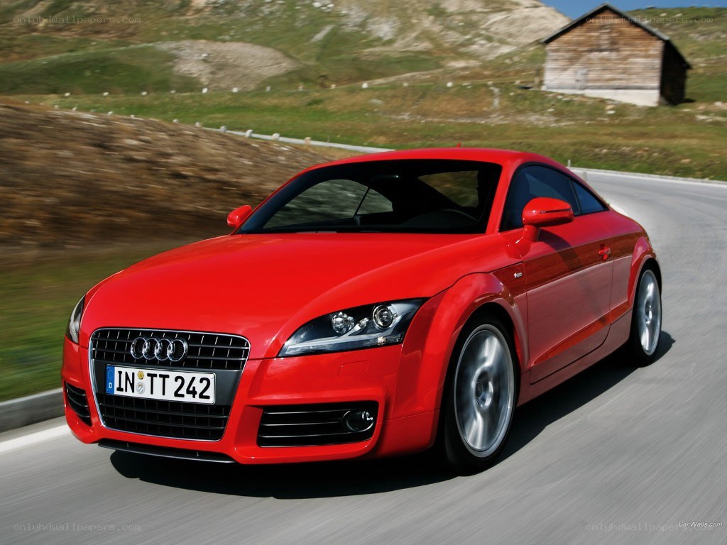 Red Audi TT in motion