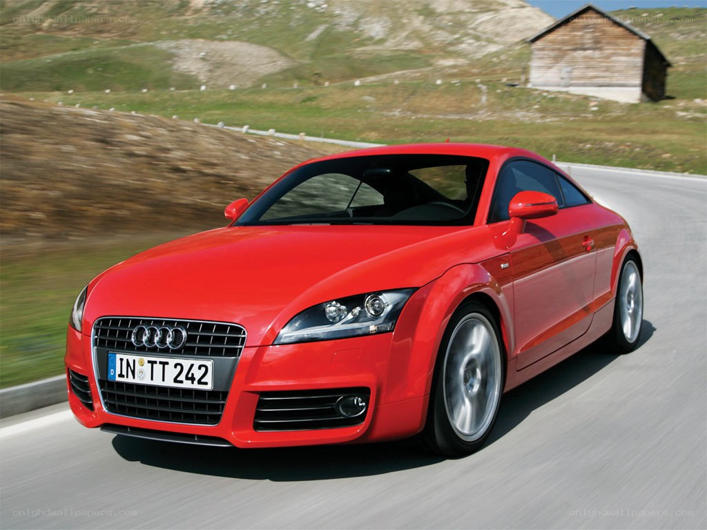 Red Audi TT in motion